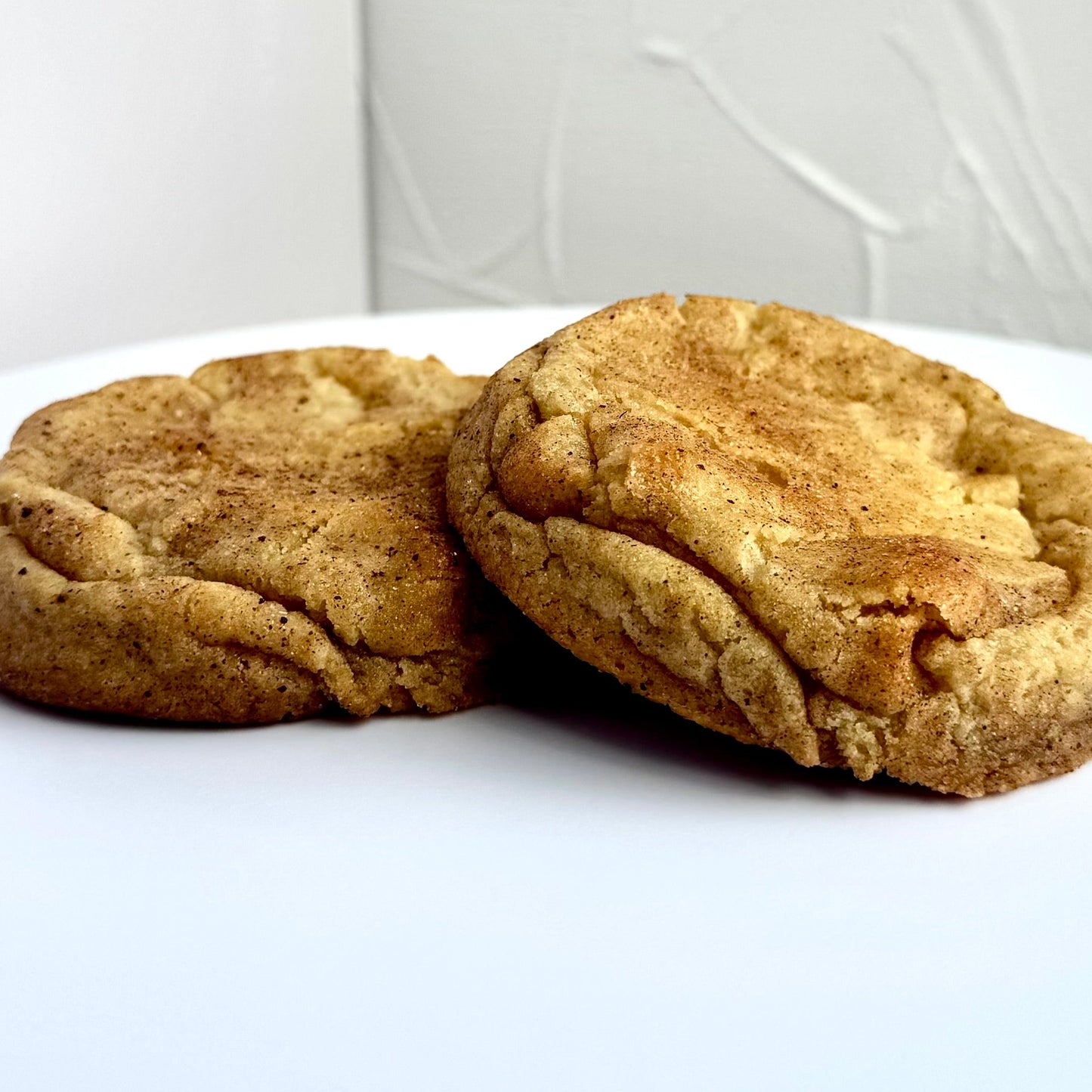 Soft and chewy chai spice cookies with cinnamon, ginger, cardamom, and cloves from Secret Ingredient Bakery