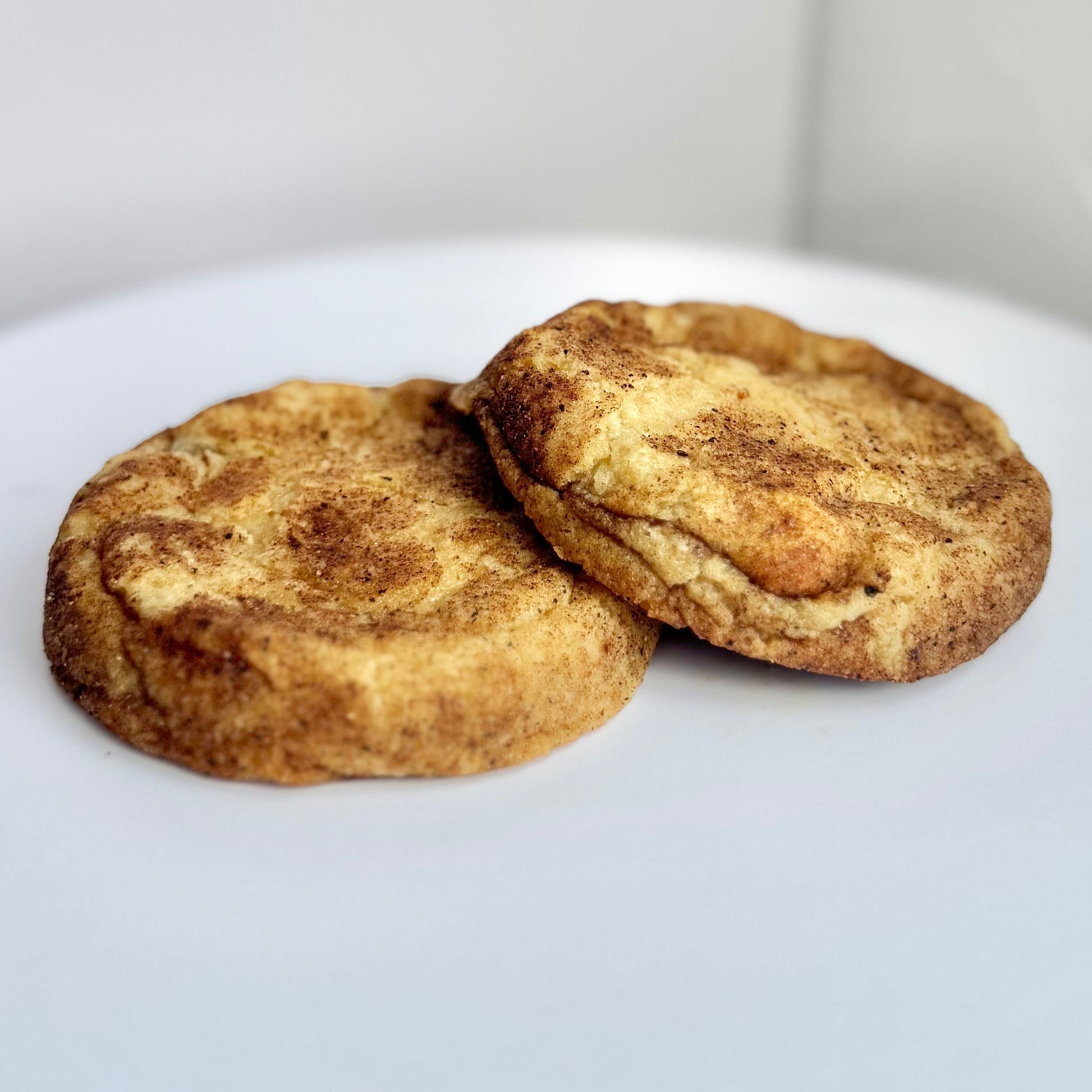 Soft and chewy chai spice cookies with cinnamon, ginger, cardamom, and cloves from Secret Ingredient Bakery