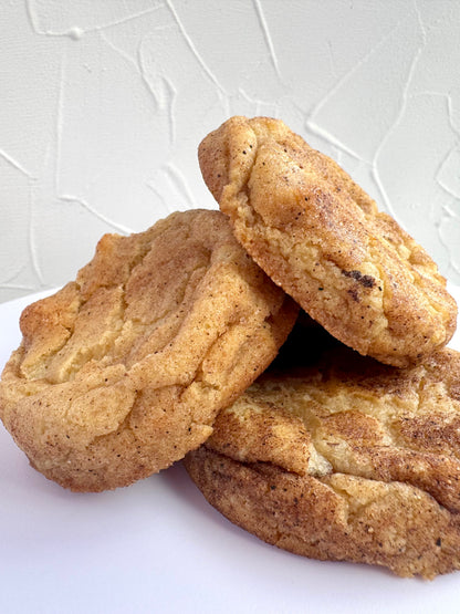 Soft and chewy snickerdoodle cookies coated in cinnamon sugar from Secret Ingredient Bakery